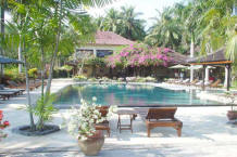 Swimming pool and long chairs